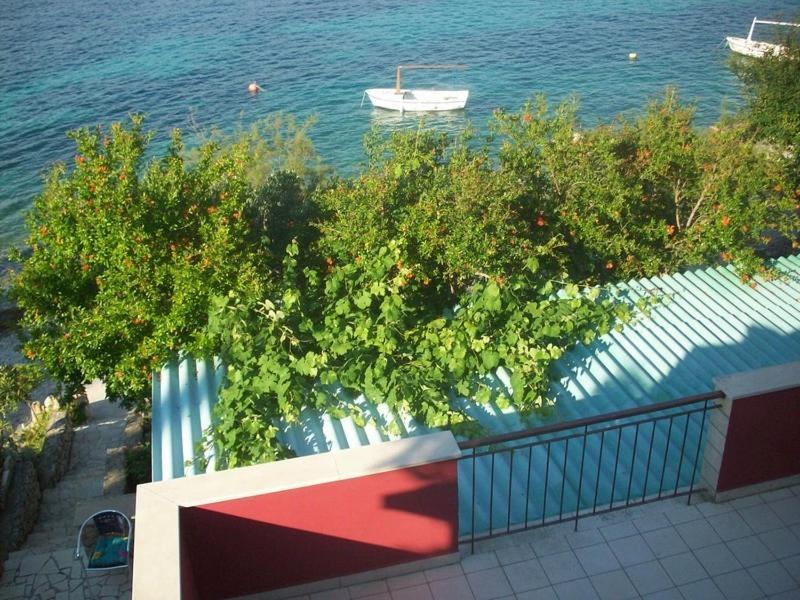 Apartments Tomovic Lumbarda Quarto foto